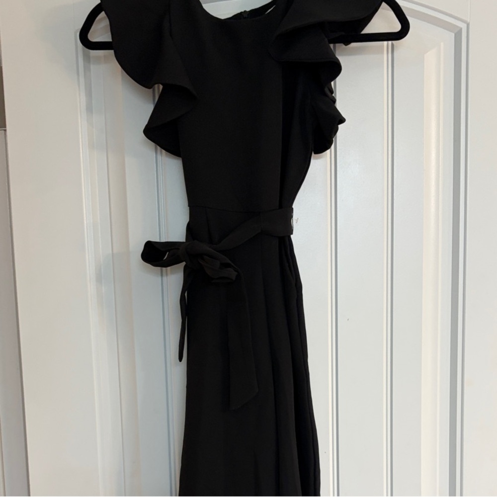 Girl’s Black Ruffle Sleeve Romper